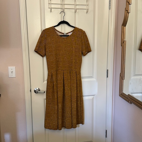 LuLaRoe Dresses & Skirts - Yellow patterned LulaRoe Dress